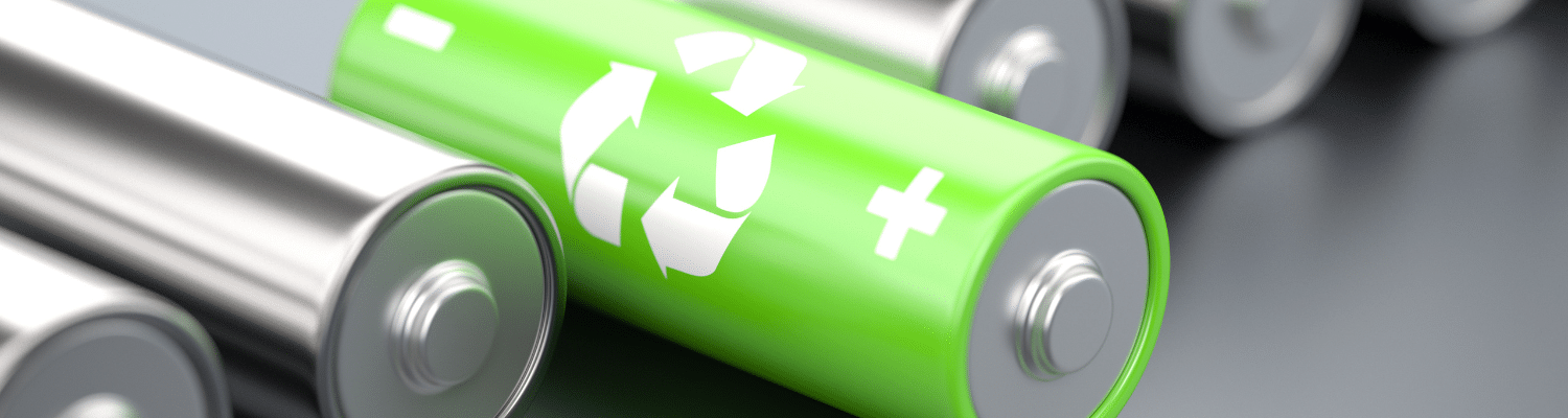 series of unlabelled batteries, with the battery in the middle being bright great with a white recycling symbol
